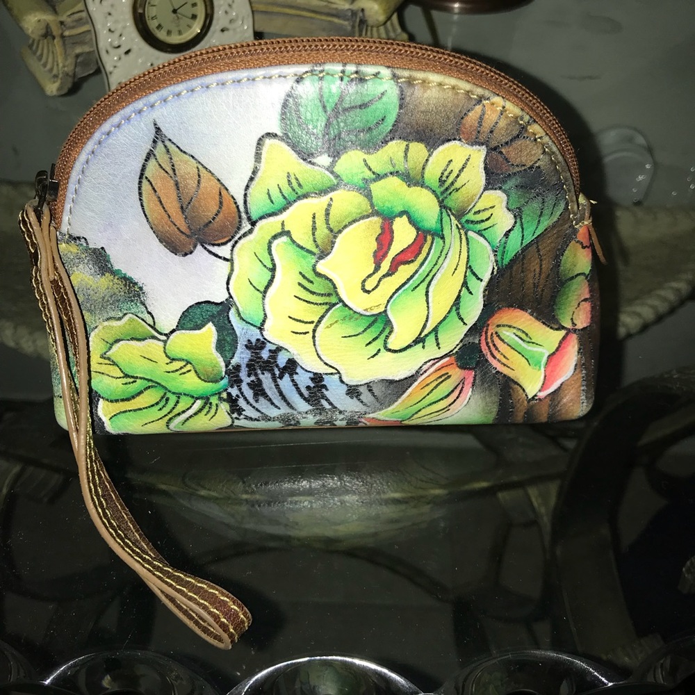 Sharif leather floral wristlet